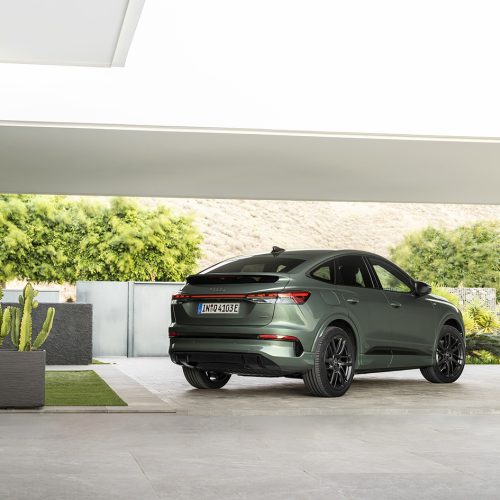 Sage green metallic, outdoor static photo, exterior, three-quarter rear view