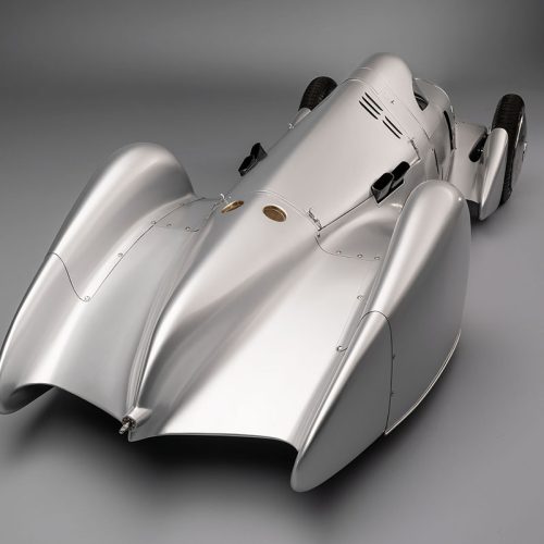 Audi recreated the Auto Union Lucca. After just over three years of construction, the record-breaking car was completed in early 2026. Studio shot. Rear view.