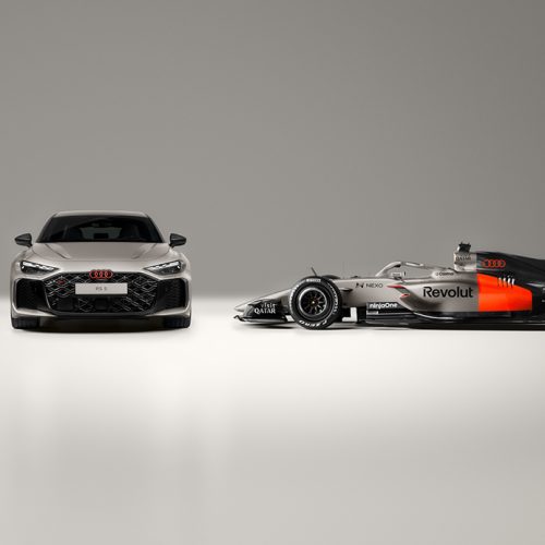 The Audi RS 5 next to the Audi R26. The RS 5 makes its debut at the Formula 1 Miami Grand Prix as a car for the F1® Pirelli Hot Laps